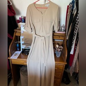 Tan jumpsuit.